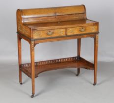 A late Victorian rosewood and foliate inlaid writing table, the domed gallery with hinged lid