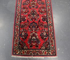 A Sarough runner, Central Persia, late 20th century, the pink field with overall floral sprays,