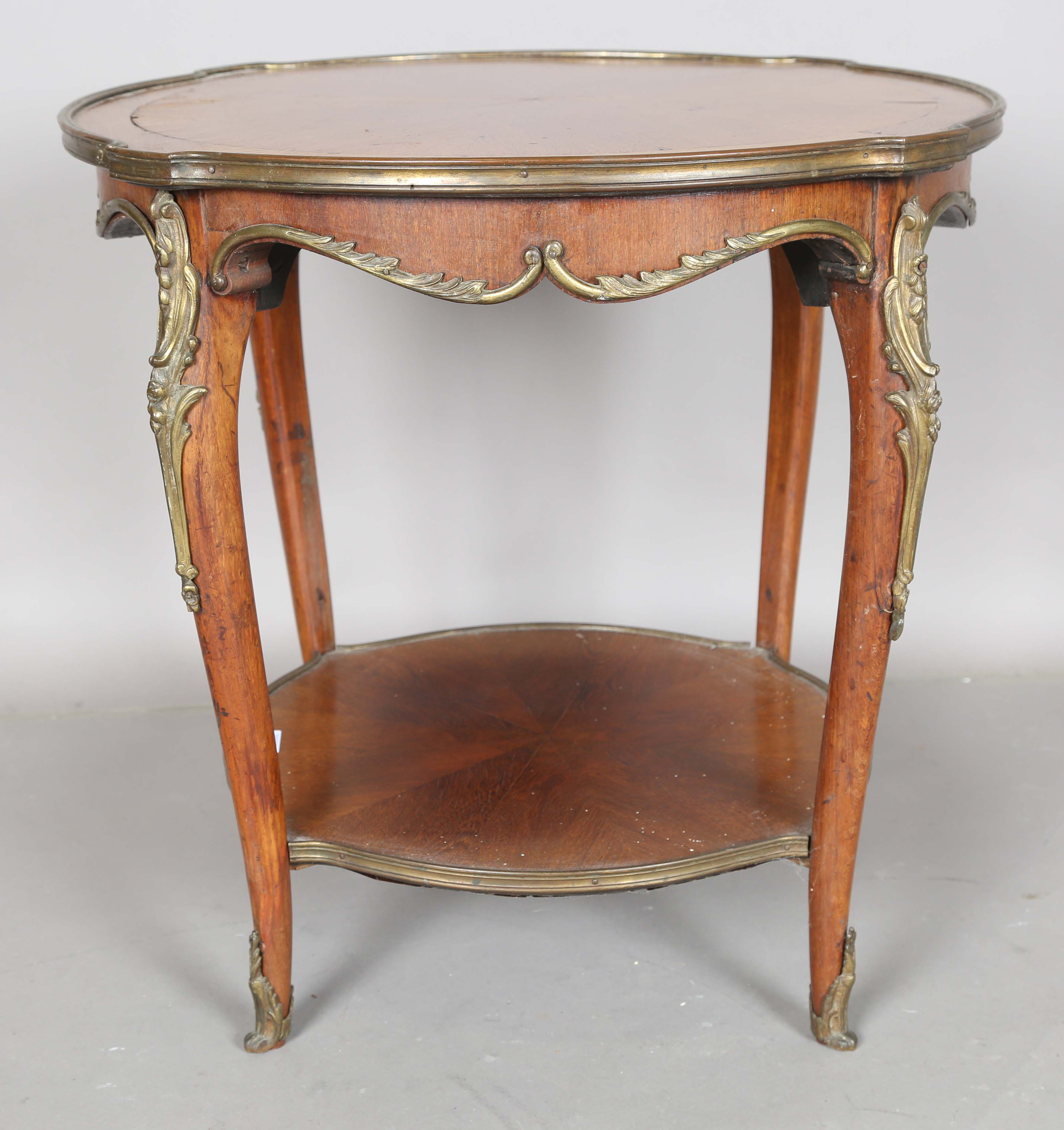 An early 20th century French walnut two-tier occasional table with radial veneers and gilt metal - Image 2 of 11