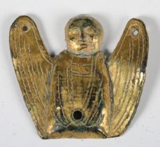 A 13th century copper alloy and gilt decorated mount in the form of an angel, height 3.5cm.Buyer’s