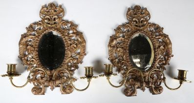 A pair of late 19th century gilt metal two-light girandoles, the frames cast with female herms and