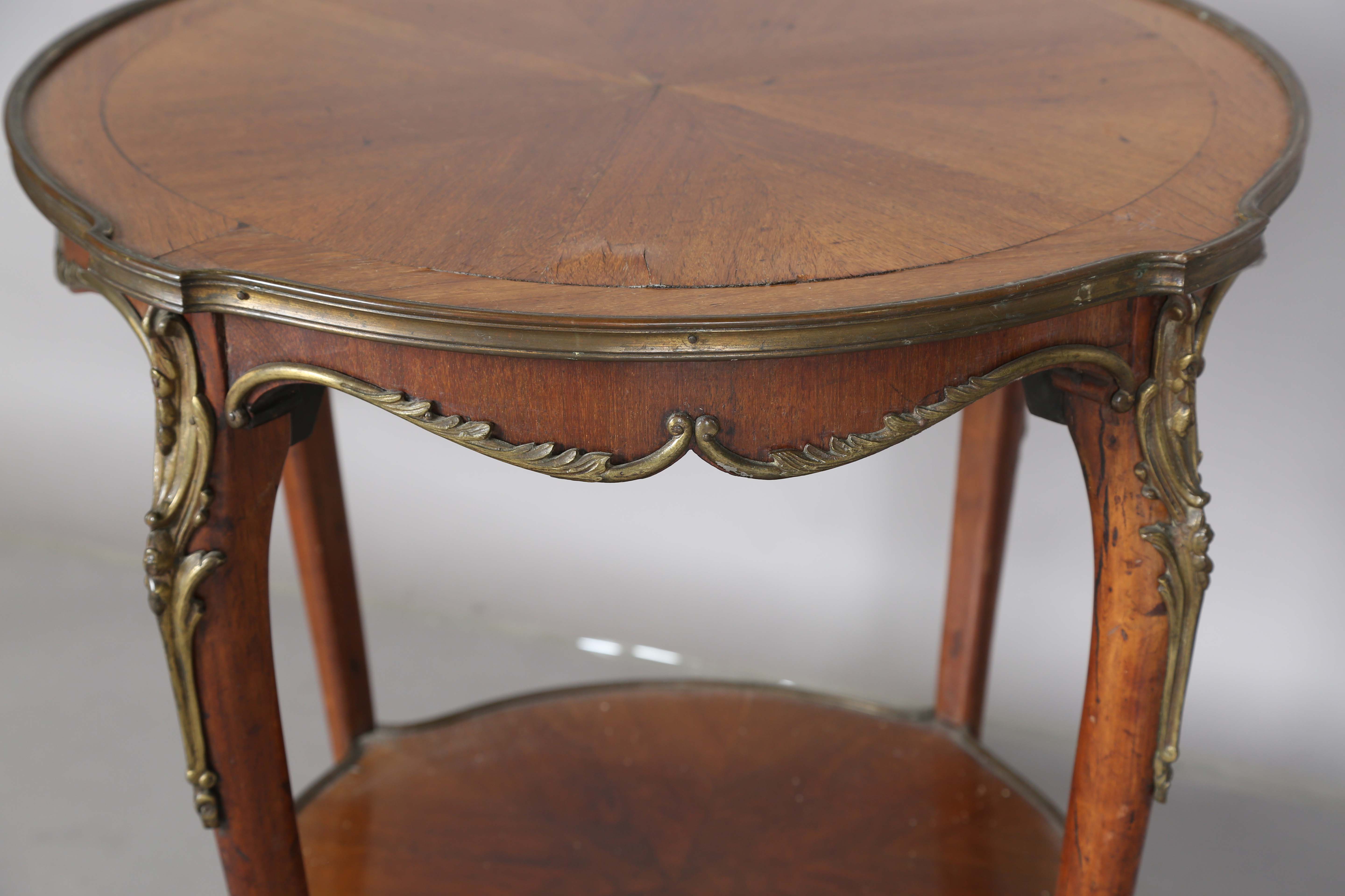 An early 20th century French walnut two-tier occasional table with radial veneers and gilt metal - Image 7 of 11