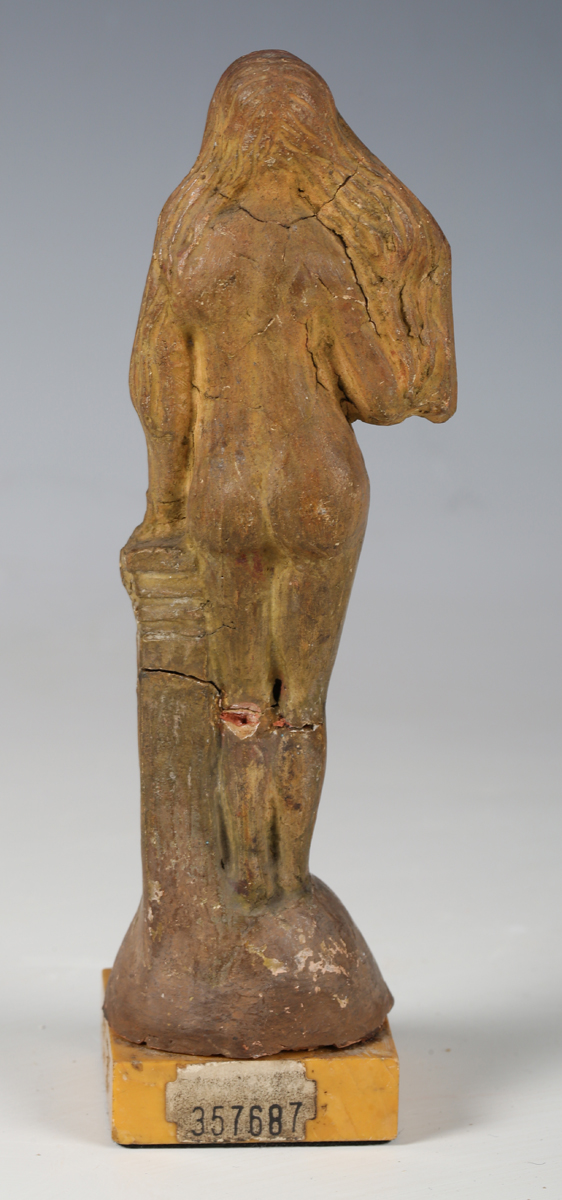 An ancient Roman terracotta full-length figure of a lady with long flowing hair, standing beside a - Image 7 of 13