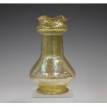 A Loetz Mimosa Candia vase, circa 1907, the low-bellied body with onion shaped neck and frill rim,