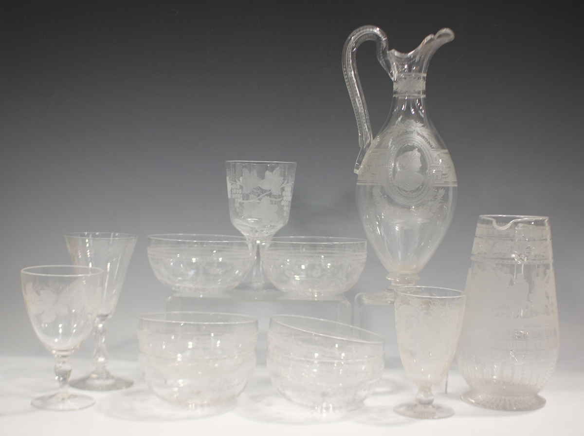 A large mixed group of assorted mostly Stourbridge engraved or acid etched glassware, late 19th/