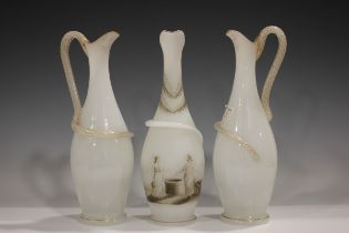 A pair of Richardson Vitrified opaque glass snake handled ewers, 19th century, of slender pear shape