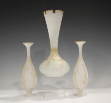 A pair of opaque alabaster glass vases, in the style of Harrach, early 20th century, of slender pear