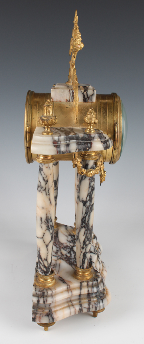 A late 19th century French gilt metal mounted marble portico clock garniture, the clock with eight - Image 7 of 12