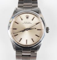 A Rolex Oyster Perpetual stainless steel bracelet wristwatch, Ref. 1002, circa 1972, with signed and