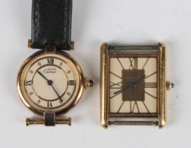 A Must de Cartier silver gilt rectangular cased Tank wristwatch, the signed gilt dial with Roman