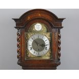 A George V oak diminutive longcase clock with three train movement chiming on gongs, the brass