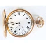 A gold plated keyless wind half hunting cased gentleman's pocket watch with unsigned jewelled