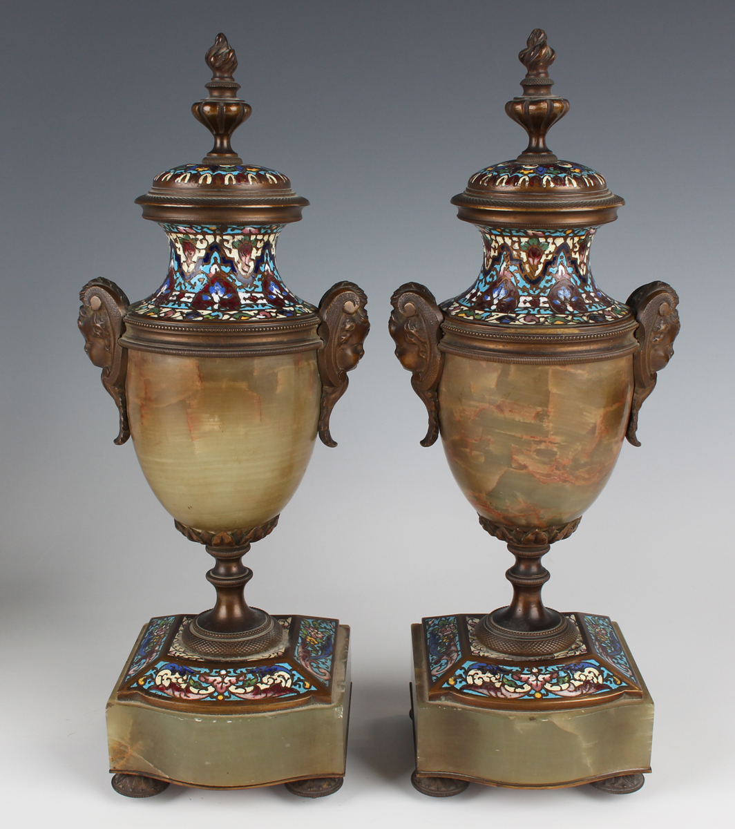 A late 19th/early 20th century French brass, onyx and champlevé enamel clock garniture, the four - Image 4 of 16