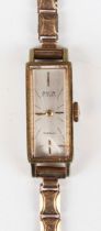 An Avia gilt metal fronted and steel backed lady's wristwatch, the signed rectangular silvered