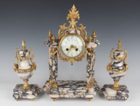 A late 19th century French gilt metal mounted marble portico clock garniture, the clock with eight