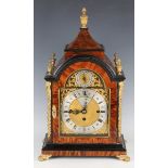 A Victorian tortoiseshell veneered and gilt brass mounted bracket clock with eight day triple