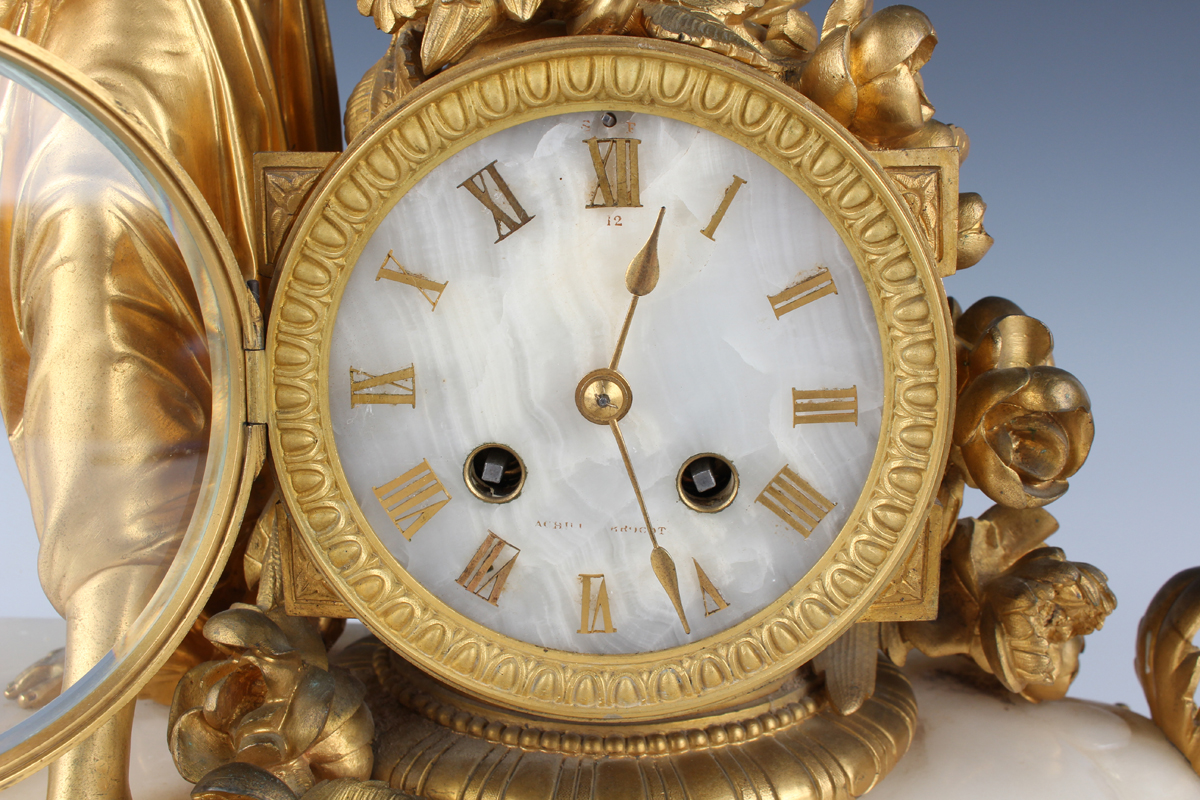 A late 19th century French ormolu and onyx mantel clock with eight day movement striking on a - Image 10 of 10