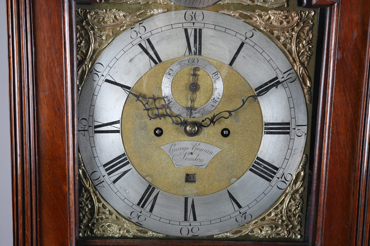 A George III mahogany longcase clock with eight day movement striking on a bell, the 12-inch brass - Image 13 of 14
