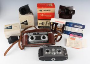 A small group of cameras and accessories, including an Edixa Stereo camera, a Verascope F40