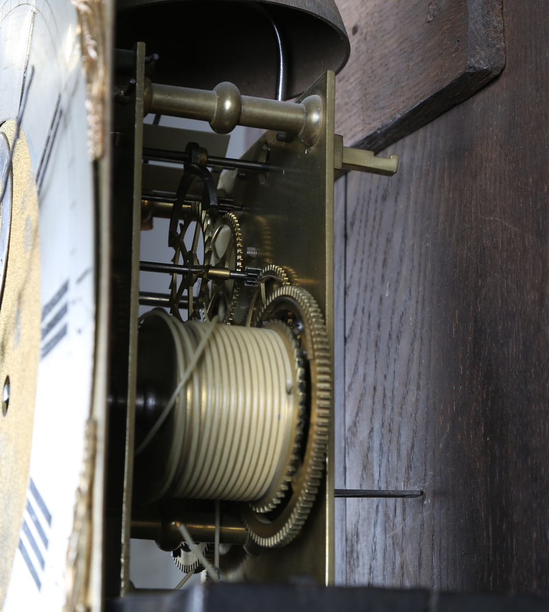 A George III mahogany longcase clock with eight day movement striking on a bell, the 12-inch brass - Image 10 of 14