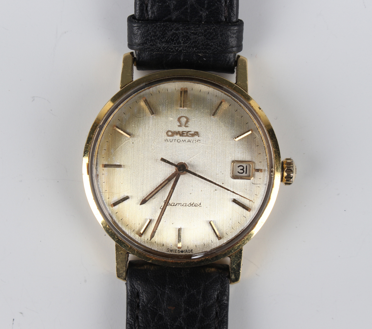 An Omega Seamaster Automatic 18ct gold circular cased gentleman's wristwatch, the signed silvered