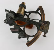 An early 20th century oxidized brass sextant, signed 'J. Sewill Liverpool', with silvered scale,