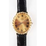 A Piaget 18ct gold oval cased lady's wristwatch, Ref. 9823, the signed gilt dial with black Roman