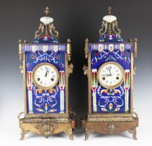 A pair of 20th century Chinese brass and cloisonné mantel clocks, each with eight day movement