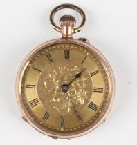 A 9ct gold circular cased keyless wind open-faced lady's fob watch, the gilt dial with black Roman