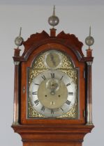 A George III mahogany longcase clock with eight day movement striking on a bell, the 12-inch brass