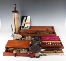 A collection of assorted scientific instruments, including a brass Reeves Folding Alidade 16 by Cary