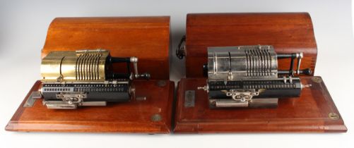 A Muldivo Britannic calculating machine by Guy's of London, with brass cover plate within a walnut