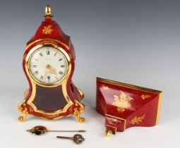 A 20th century Zenith red and gilt lacquered bracket clock and bracket, the clock striking on a