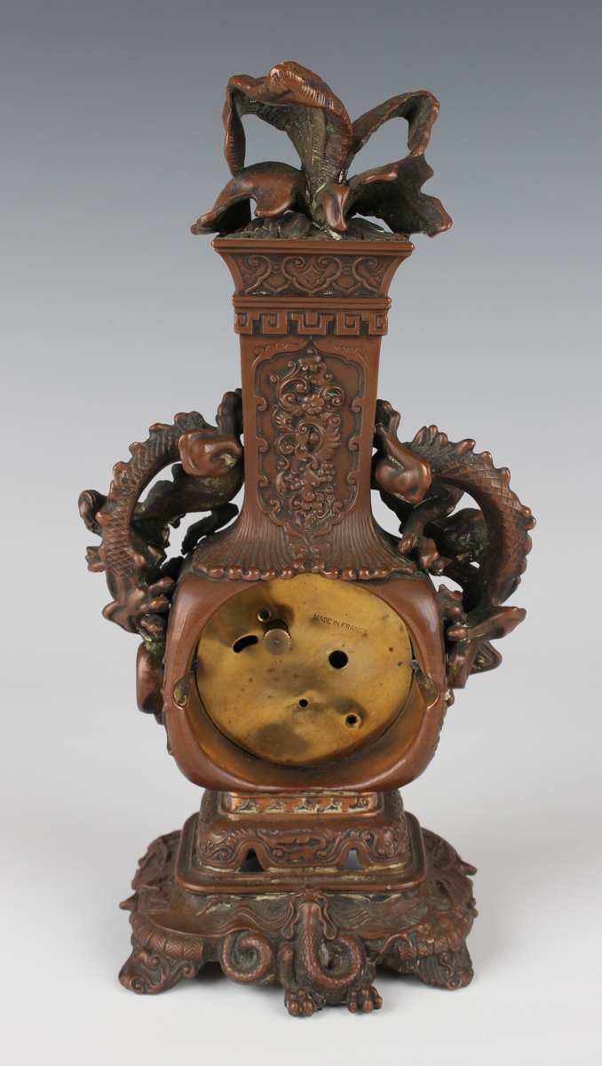 A late 19th century French chinoiserie bronze effect cast metal mantel timepiece, the gilt - Image 8 of 9