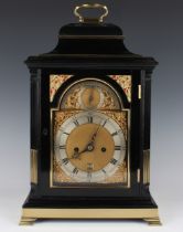 A George III brass mounted ebonized bracket clock, the brass five pillar eight day twin fusee