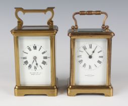 A late 19th/early 20th century French brass carriage clock with eight day movement striking hours on