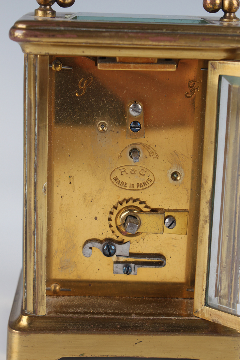 A late 19th/early 20th century French brass carriage clock with eight day movement striking hours on - Image 7 of 16