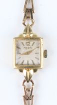 A Nivada 18ct gold rectangular cased lady's wristwatch with unsigned jewelled movement, the signed