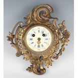 A late 19th century French gilt metal cased wall clock with eight day movement striking on a bell,