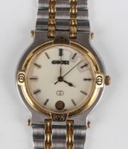 A Gucci 9000 M Quartz steel and gilt gentleman's bracelet wristwatch, the signed dial with date