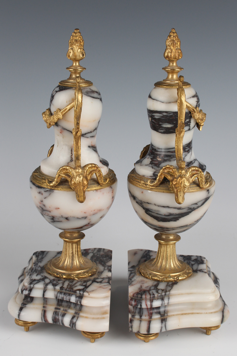 A late 19th century French gilt metal mounted marble portico clock garniture, the clock with eight - Image 3 of 12