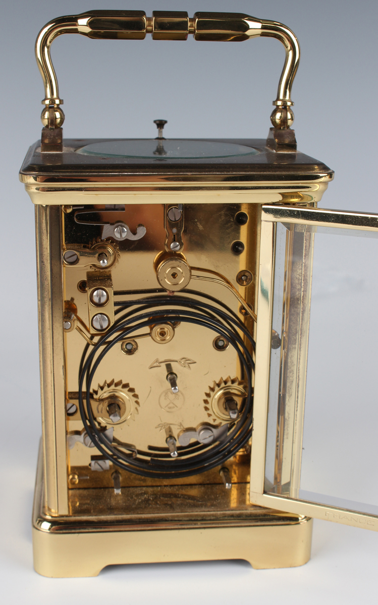 A late 20th century French lacquered brass corniche cased calendar carriage alarm clock by L'Epée, - Image 6 of 7