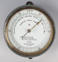 A Negretti & Zambra of London 'Fisherman's Aneroid Barometer', the signed circular enamelled dial