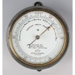 A Negretti & Zambra of London 'Fisherman's Aneroid Barometer', the signed circular enamelled dial