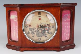 A mid-20th century Chinese Cultural Revolution Propaganda mantel alarm clock, the printed circular