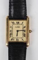 A Must de Cartier silver gilt rectangular cased lady's Tank wristwatch, the signed dial with black