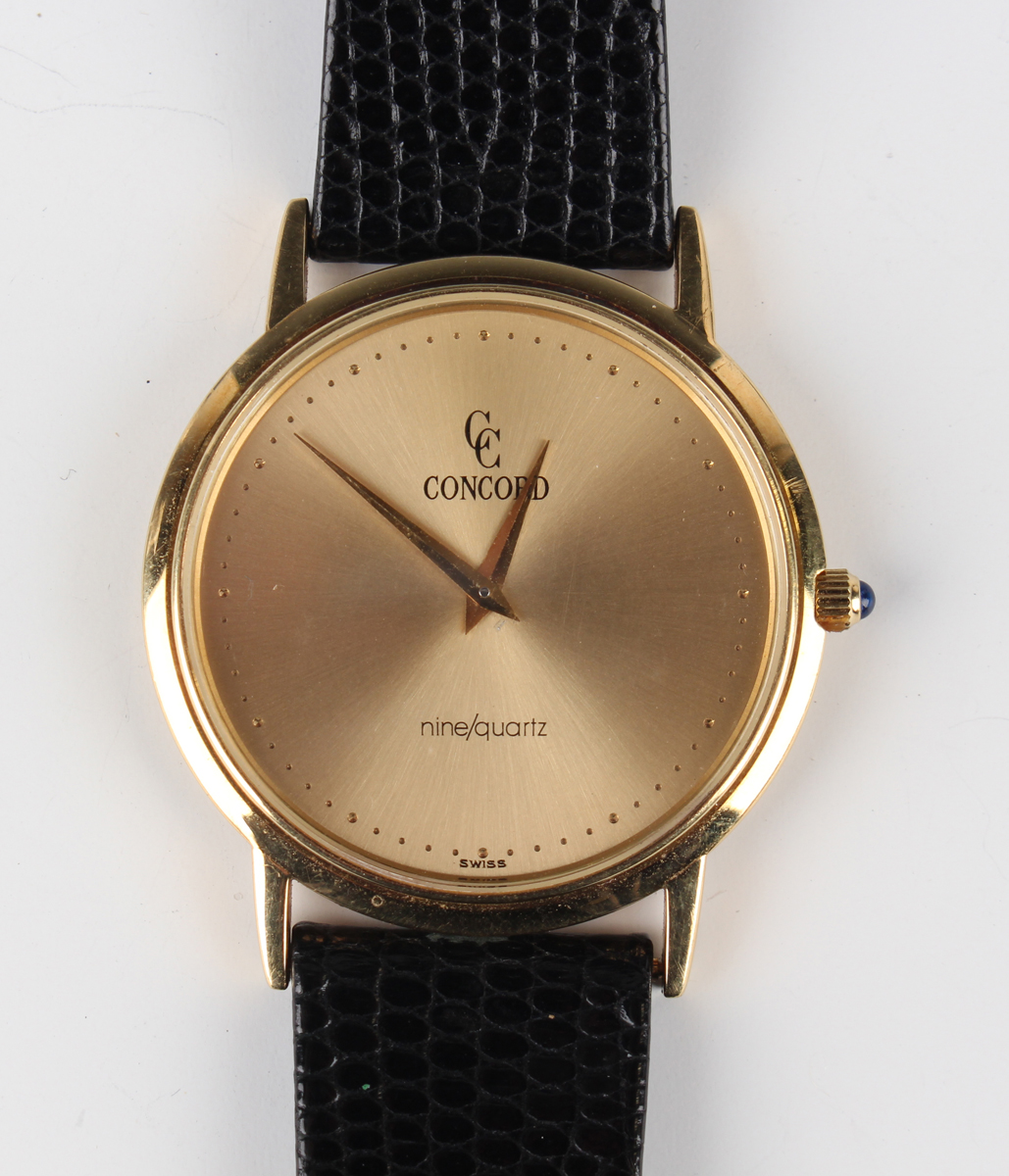 A Concord Mariner Nine/Quartz 18ct gold circular cased gentleman's wristwatch with signed gilt dial,