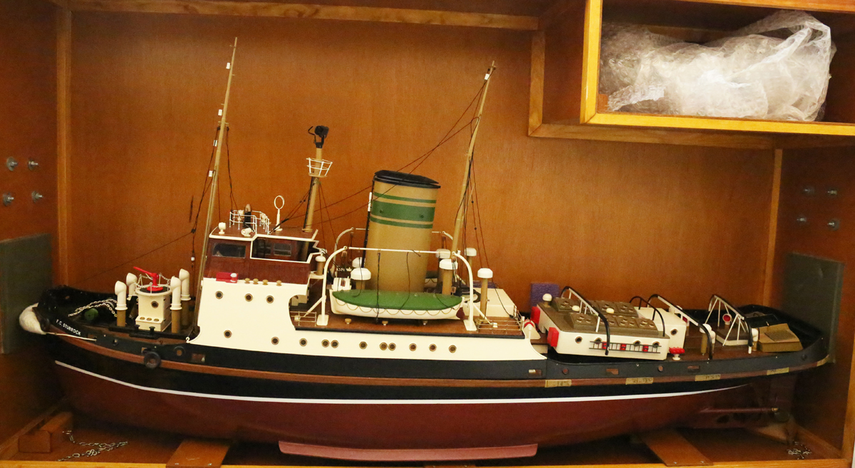 A remote control model of the tug boat 'F.C. Sturrock', with control, length 101cm, with wooden