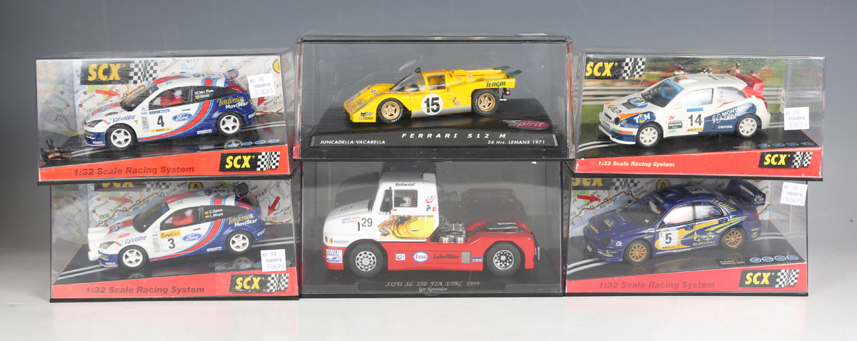 A Scalextric slot-car C2635 Batmobile, a C6002 Makoto Tamada Honda and a C6009 Troy Bayliss - Image 2 of 5