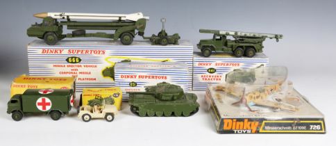 A small group of Dinky Toys and Supertoys military vehicles and accessories, including No. 666